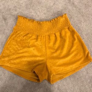 yellowish flowy shorts